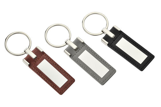 De promotiesleutelring Debossing Gepersonaliseerd Logo Zinc Alloy Material van het Douaneleer