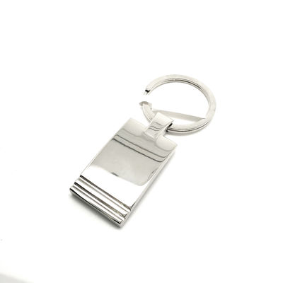 Individuele polybagpakket voor duurzame metalen sleutelhanger met zilveren afwerking